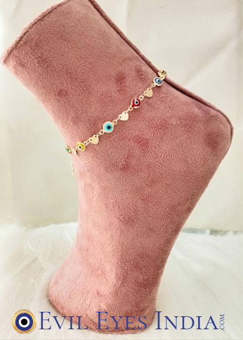 Subtle yet sophisticated, this dainty evil eye anklet with hearts features small heart charms on an ultra-fine, anti-tarnish chain. It’s perfect for those who appreciate a minimalist aesthetic with a bit of mystique and resilience in their jewelry.