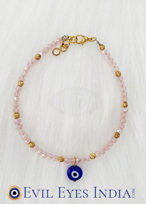 Evil Eye Anklet with Pink coloured beads. It’s a timeless piece, perfect for adding a hint of classic protection that will remain beautiful year after year.