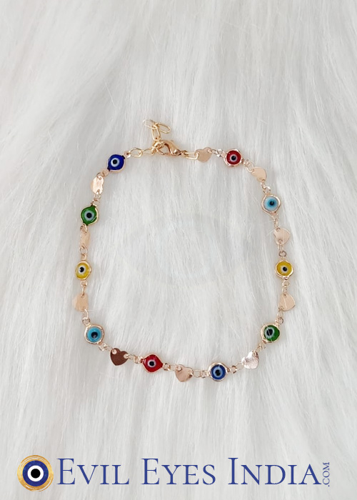 Subtle yet sophisticated, this dainty evil eye anklet with hearts features small heart charms on an ultra-fine, anti-tarnish chain. It’s perfect for those who appreciate a minimalist aesthetic with a bit of mystique and resilience in their jewelry.