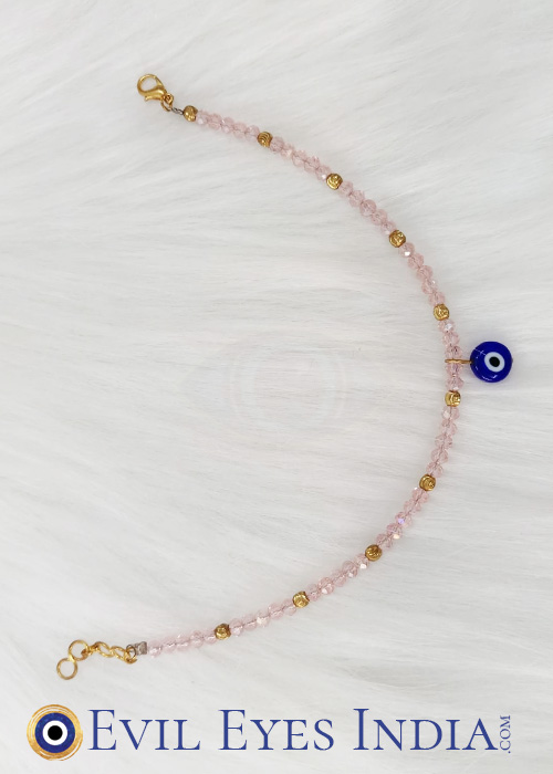 Evil Eye Anklet with Pink coloured beads. It’s a timeless piece, perfect for adding a hint of classic protection that will remain beautiful year after year.