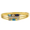 Triple-Layer Gold Evil Eye Bangle
