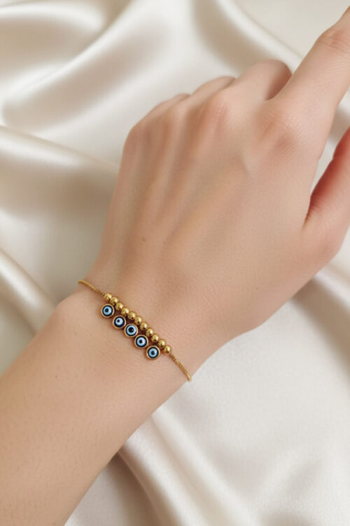 Delicate Gold Anti-Tarnish Beaded Slider Bracelet with Five Evil Eyes
