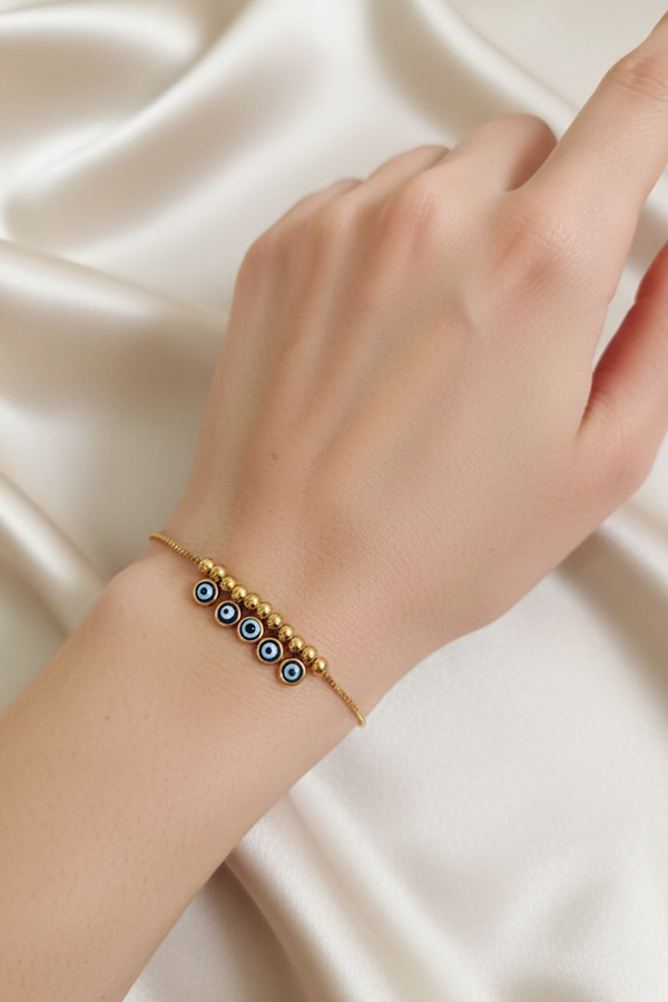 Delicate Gold Anti-Tarnish Beaded Slider Bracelet with Five Evil Eyes