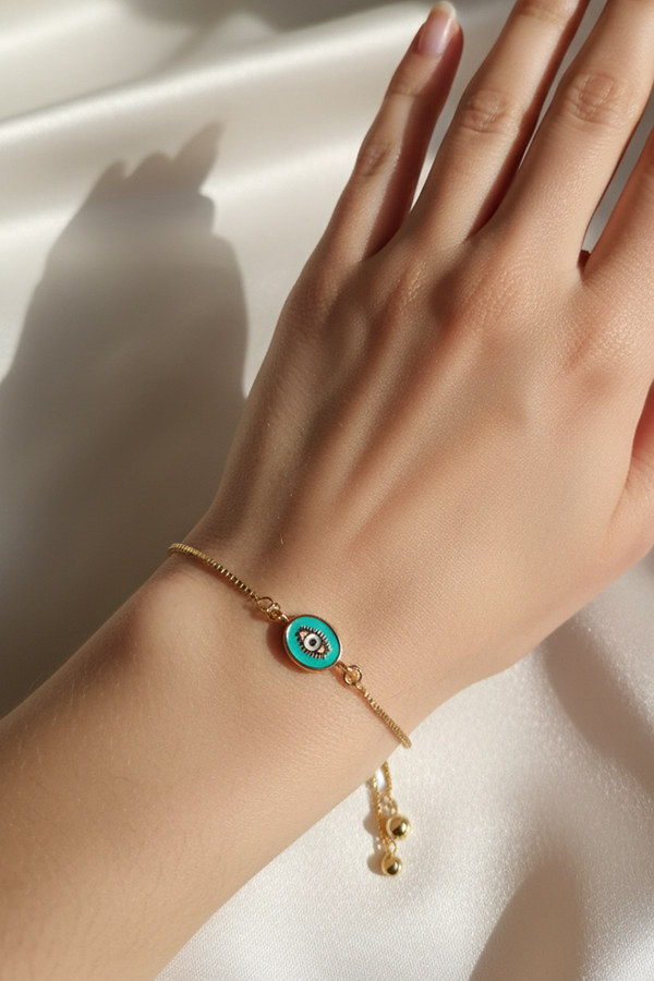 Chic Gold Adjustable Slider Bracelet with Oval Teal Evil Eye