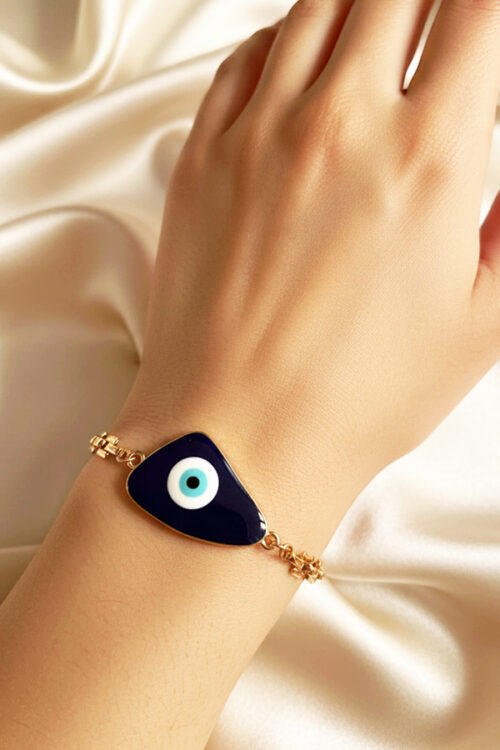 Bold Gold Statement Bracelet with Triangular Navy Evil Eye Charm