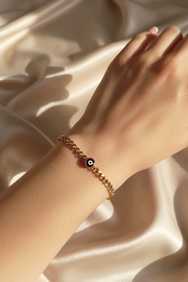 Classic Gold Curb Chain Bracelet with Bold Black Evil Eye Charm