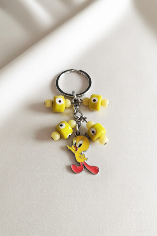 Playful Tweety Bird Keychain with Yellow Evil Eye Bead Accents