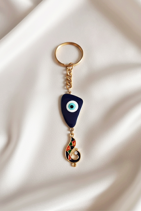Bold Gold Abstract Evil Eye Keychain with Peacock Charm
