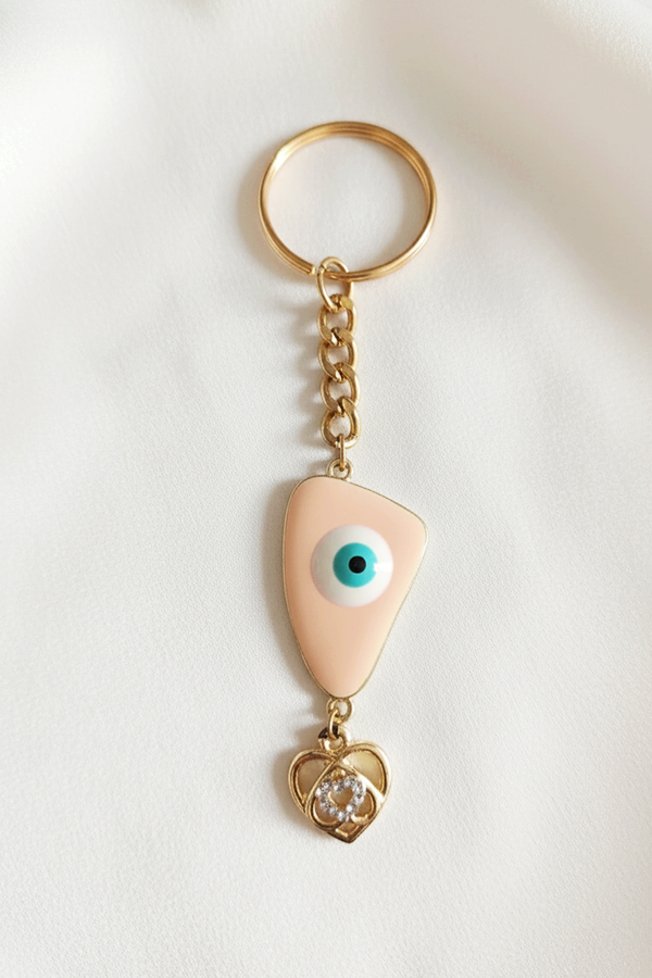 Chic Gold Evil Eye Keychain with Peach Enamel & Crystal Heart Charm