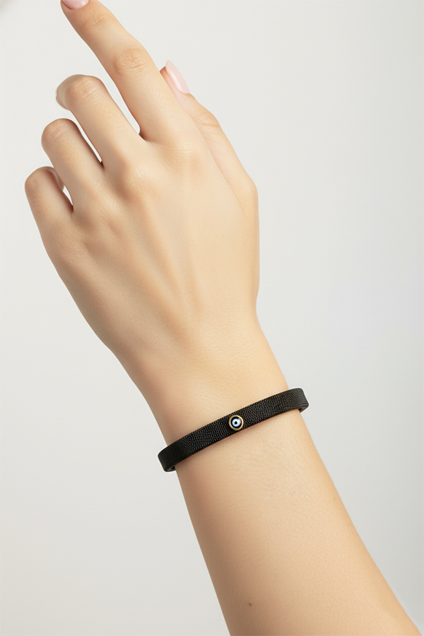 Sleek Black Mesh Cuff Bangle with Minimalist Evil Eye Accent