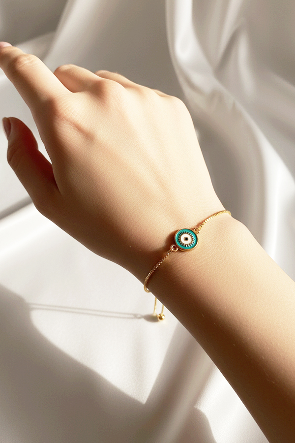 Elegant Gold Adjustable Slider Bracelet with Teal Sunburst Evil Eye