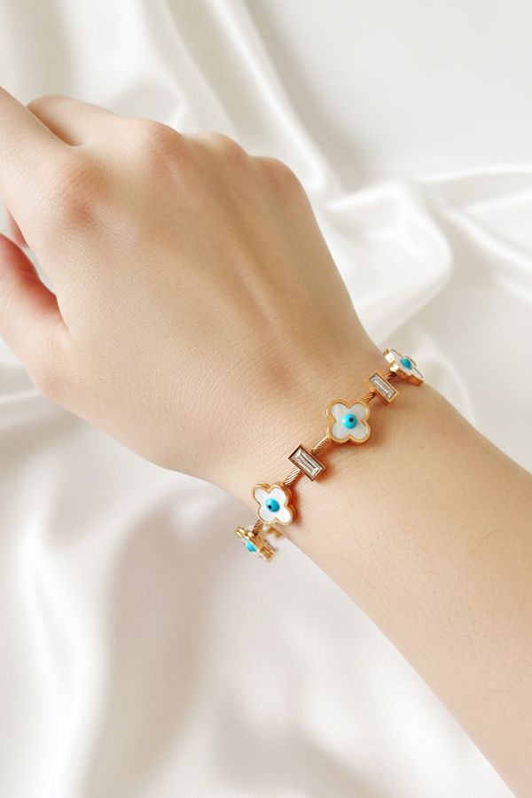 Elegant Gold Cable Bangle with Mother-of-Pearl Clover Evil Eyes & Crystal Accents