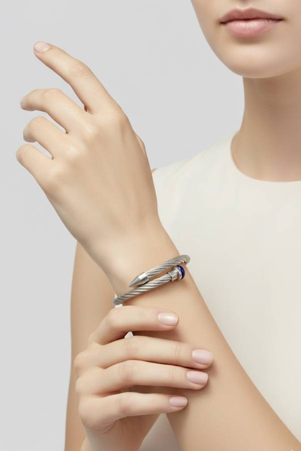 Silver-Tone Twisted Cable Evil Eye Bangle