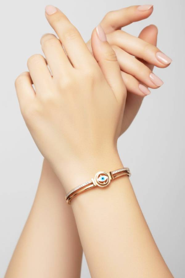 Elegant Rose Gold Evil Eye Bangle with Crystal Accents