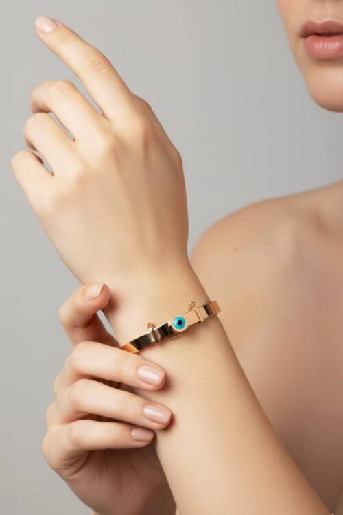 Chic Gold Slider Bangle with Central Evil Eye Charm
