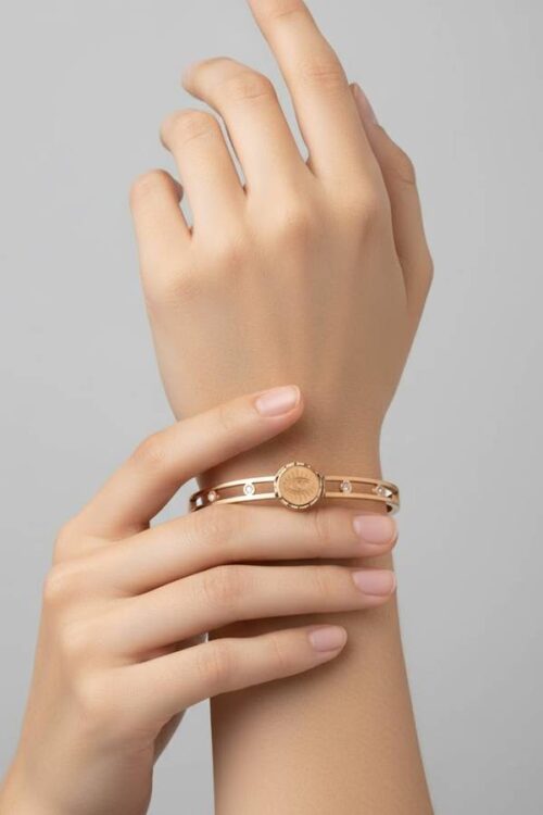 Chic Gold Cuff Bangle with Detailed Evil Eye Coin and Crystal Accents