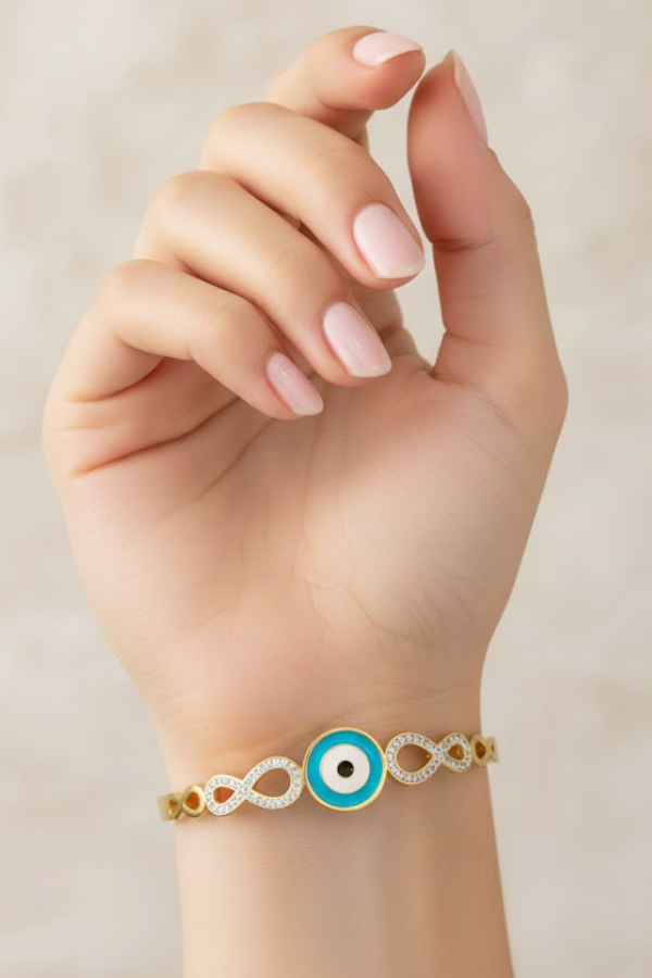 Infinity & Evil Eye Gold Bangle with Pave Crystal Accents