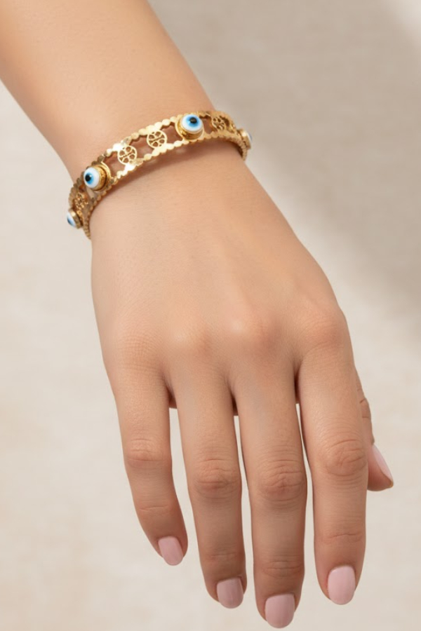 Intricate Gold Filigree Bangle with Multiple Evil Eye Charms