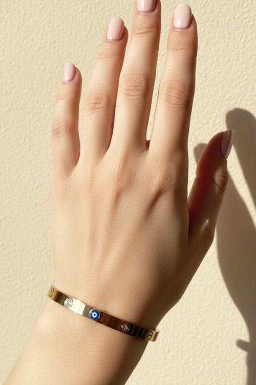 Classic Gold Evil Eye Bangle with Diamond Accents - Timeless Protection Jewelry