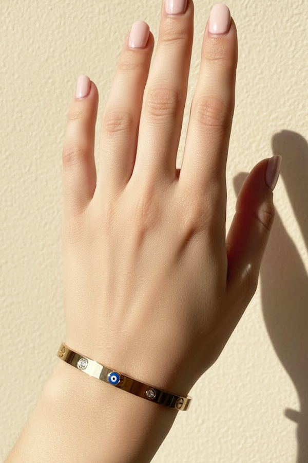 Classic Gold Evil Eye Bangle with Diamond Accents - Timeless Protection Jewelry