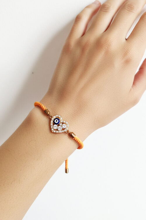 Adjustable Orange Cord Bracelet with Crystal Heart & Evil Eye Charm